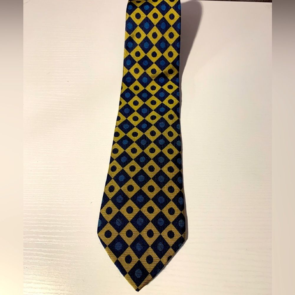 Tommy Hilfiger, blue and gold tie hundred percent silk made in the USA